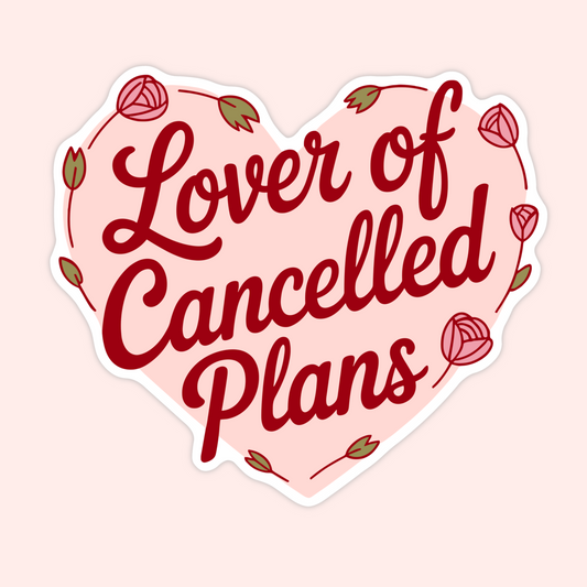 Pink heart-shaped vinyl sticker with floral details and the phrase “Lover of Cancelled Plans.”