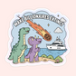 Funny dinosaur sticker with a meteor, yacht, and text that says Make Billionaires Extinct.
