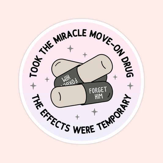 Circular sticker with two capsules labeled “Forget Him” surrounded by text that says “Took the miracle move-on drug, the effects were temporary.”
