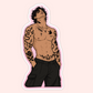 A die-cut vinyl sticker featuring a stylized illustration of a shirtless man with black tattoos, wearing black cargo shorts, shown on a light pink background.