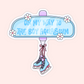 Blue hockey rink sign sticker with flowers, hanging blue ice skates, and text that says “On My Way To The Boy Aquarium.”
