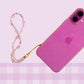 Pastel sparkle beaded phone wristlet with colourful pastel beads, glittery pink accent beads, iridescent details, and a gold phone strap attachment.