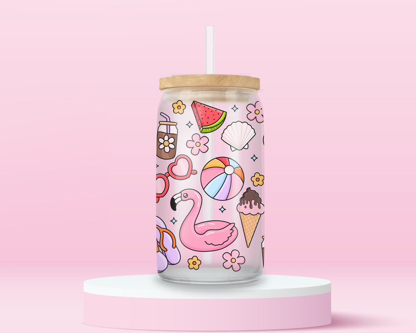 Glass can tumbler with bamboo lid and glass straw featuring a pink flamingo float, beach ball, watermelon, sunglasses, iced coffee, flowers, seashells, and ice cream on a pink background.