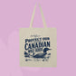 Beige canvas tote bag featuring navy vintage-style text that says Protect Our Stupid Canadian Wolf Birds with a loon and lake illustration.