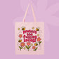 Pink canvas tote bag featuring flowers, bees, and bold pink text that says Protect The F*cking Locals.