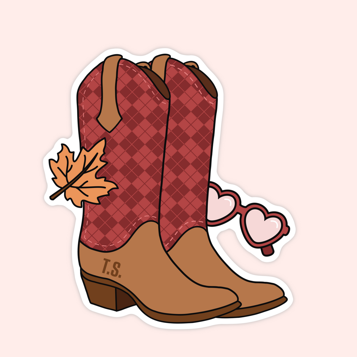 A die-cut sticker featuring a pair of cowboy boots with a red argyle pattern and tan leather detailing, accompanied by an orange maple leaf and pink heart-shaped sunglasses, on a pale pink background.