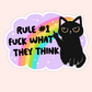 Black cat holding up a middle finger in front of a rainbow cloud with the text “Rule #1 fuck what they think.”