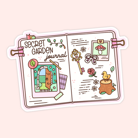 Cute cottagecore journal sticker with a secret garden page, mushroom picture, key, rose, duck, and whimsical garden details.