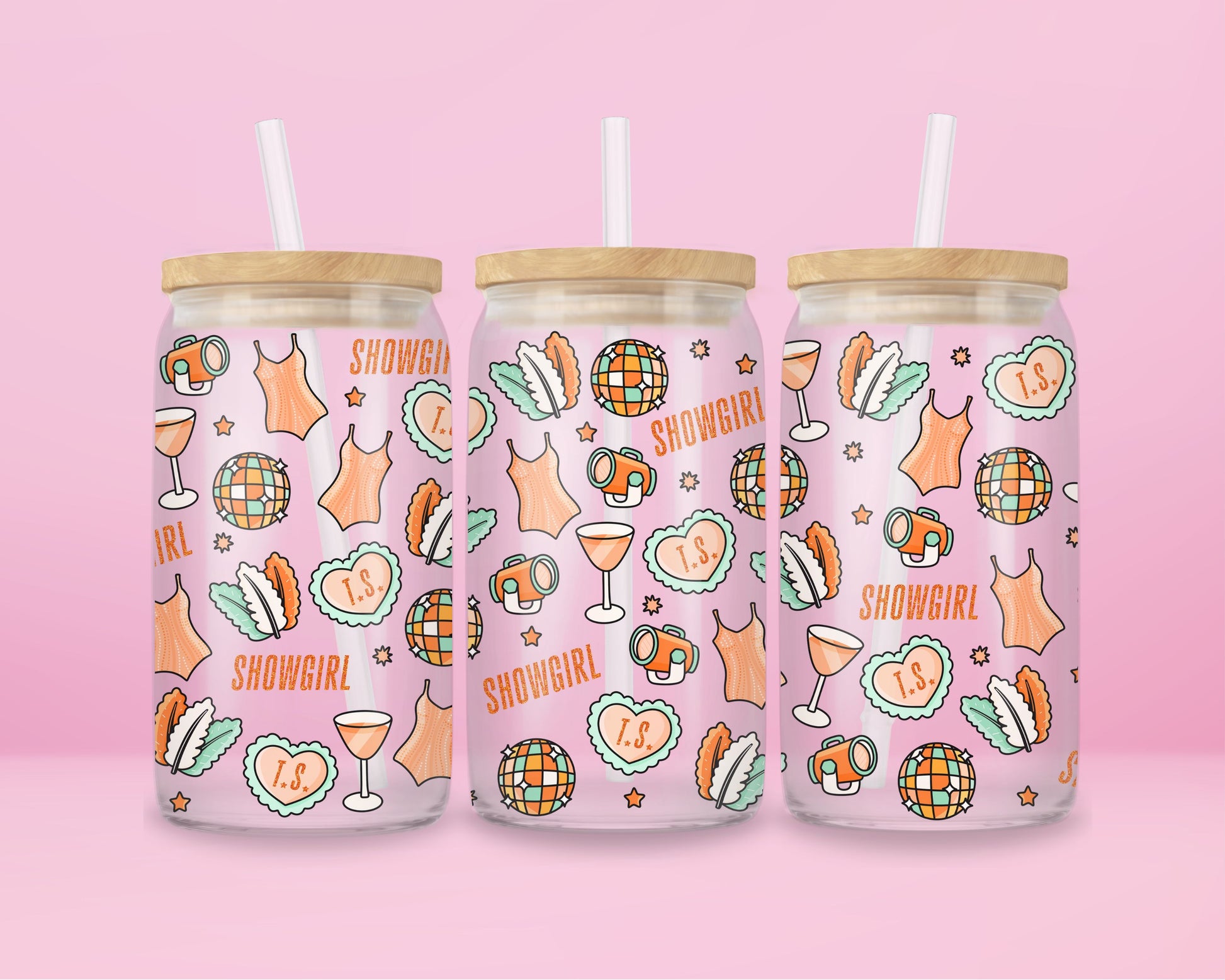 glass tumbler with repeating disco balls, showgirl corsets, cocktails, spotlights, and “T.S.” hearts.