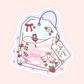 Cute silly goose tea bag sticker with geese, flowers, pink clouds, bow details, and a strawberry.
