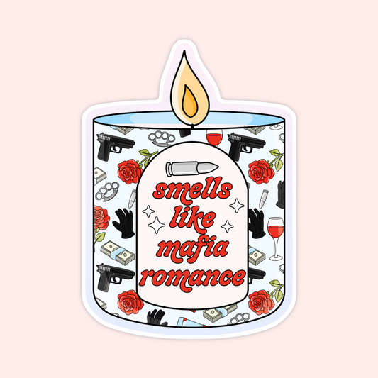 Sticker of a lit candle with the words “smells like mafia romance” surrounded by roses, gloves, cash, wine, and guns.