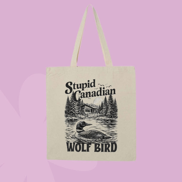 Canvas tote bag with vintage loon illustration and the phrase stupid Canadian wolf bird inspired by Heated Rivalry.
