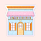 Colourful summer bookstore sticker featuring a blue shopfront with orange shutters, a pink awning, and beachy shell details.