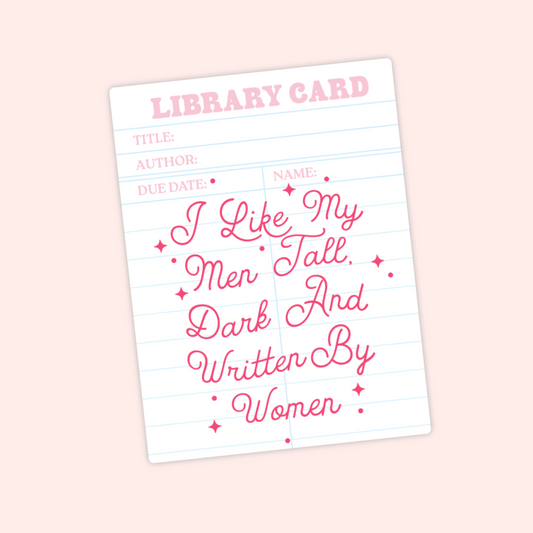 Vintage library card design with pink text that says "I Like My Men Tall, Dark, and Written by Women."