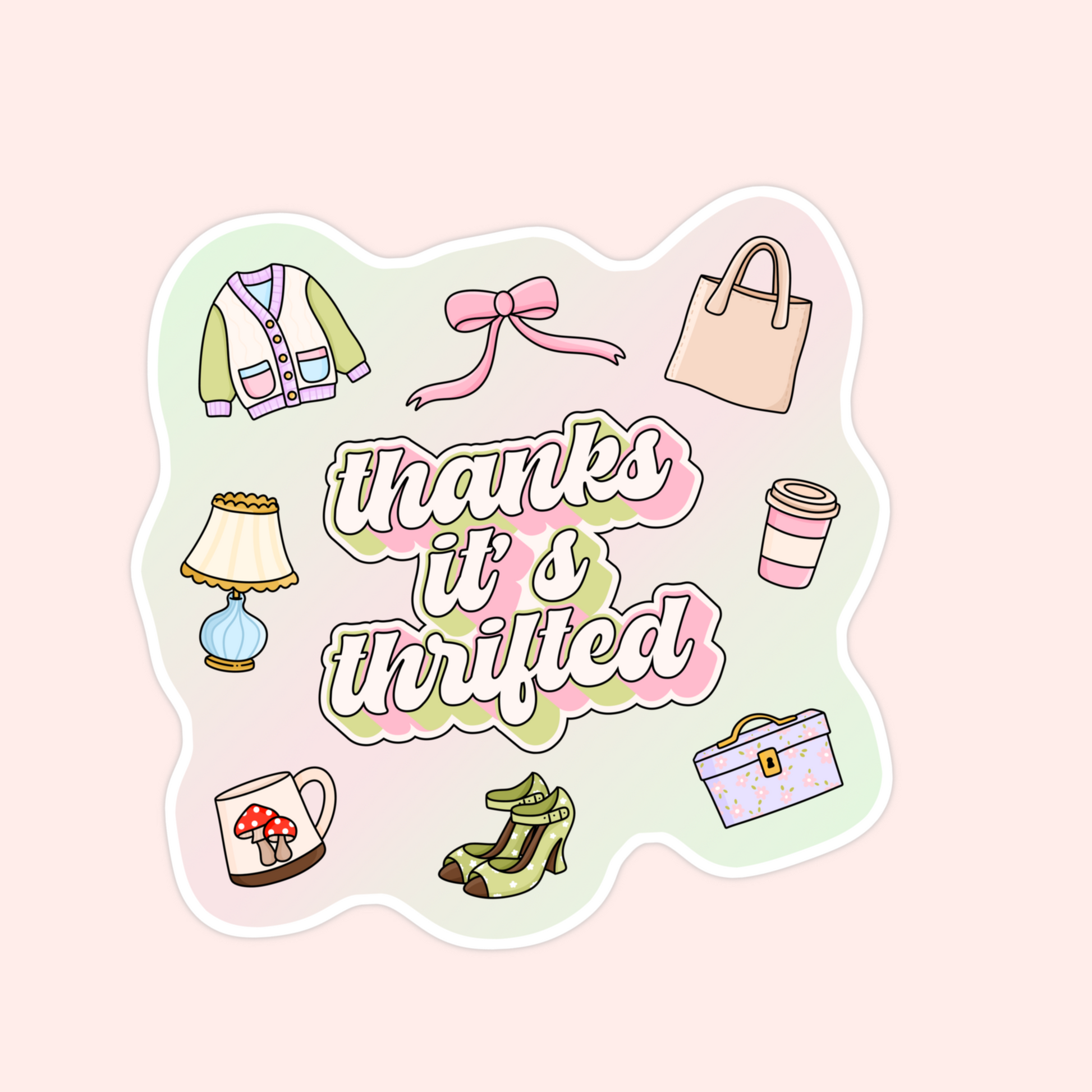 Sticker with the words “thanks it’s thrifted” surrounded by illustrations of a sweater, bow, tote bag, coffee cup, lamp, mug, heels, and a lunchbox.