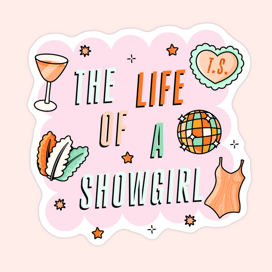 Pink sticker with the words “The Life of a Showgirl” surrounded by feathers, disco ball, cocktail, bodysuit, and a heart with T.S. initials.
