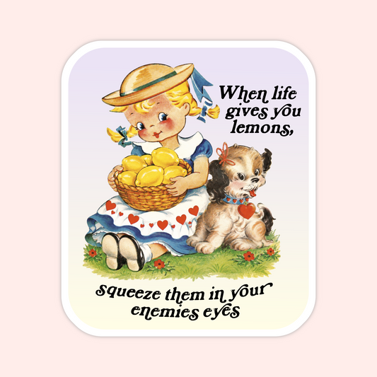 A vintage-style illustrated sticker or print featuring a blonde girl in a straw hat holding a basket of lemons, with a small dog beside her. The text reads, 'When life gives you lemons, squeeze them in your enemies eyes.