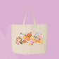 Large beige canvas tote bag featuring an orange cat, mushrooms, bluebell flowers, ladybugs, leafy stems, and woodland cottagecore illustrations.