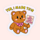 Cute vinyl sticker featuring a stitched teddy bear holding a sign that says “No I Won’t Make You One” with the phrase “Yes, I Made This.”