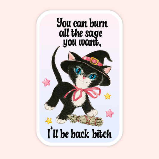 A rectangular sticker with rounded corners featuring a cartoon black-and-white kitten in a witch hat and pink bow, standing on a bundle of sage with text reading, 'You can burn all the sage you want, I'll be back bitch.' on a pale pink background.