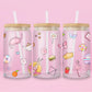 Glass can tumbler with bamboo lid and glass straw featuring pastel teapots, dice, flowers, lipstick, and a pool float girl illustration inspired by a colourful pop music video.