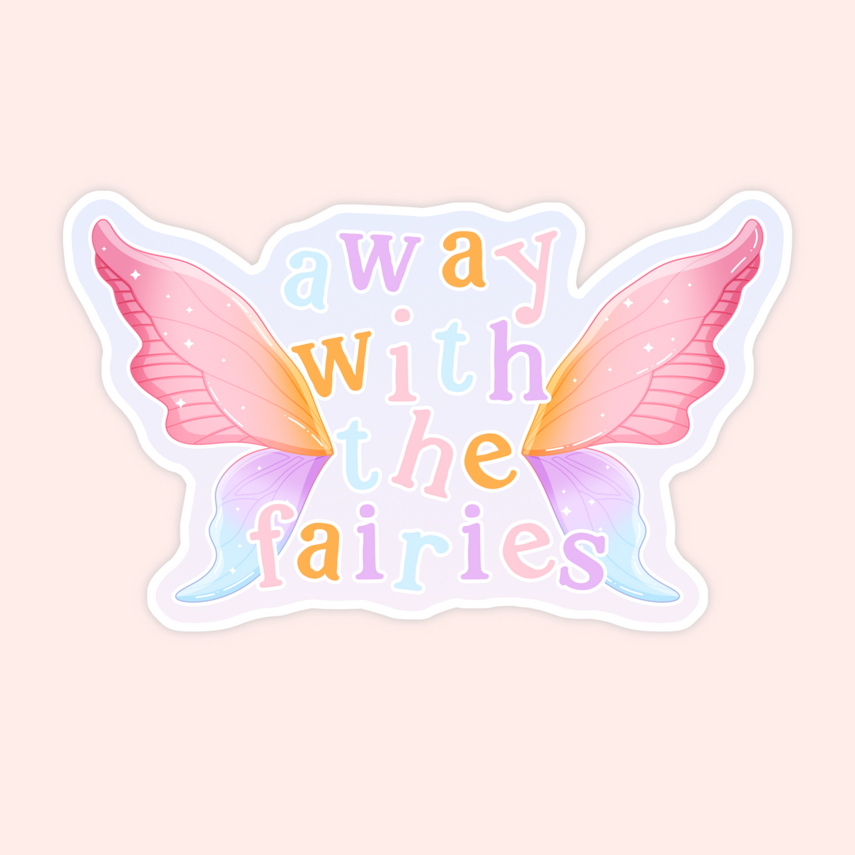 A die-cut sticker featuring pastel-colored fairy wings and the text 'away with the fairies' in soft multicolor lettering, shown on a pale pink background.