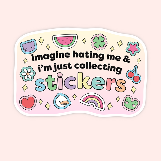 A die-cut sticker with a wavy white border featuring the text 'imagine hating me & i'm just collecting stickers' in black, surrounded by pastel-colored cartoon icons including a watermelon slice, cherry, rainbow, flower, duck, frog, and star on a pink and cream background.
