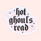 A die-cut sticker with the phrase 'hot ghouls read' in black gothic lettering, accented with pink drop shadows and white ghost illustrations, shown on a pale pink background.