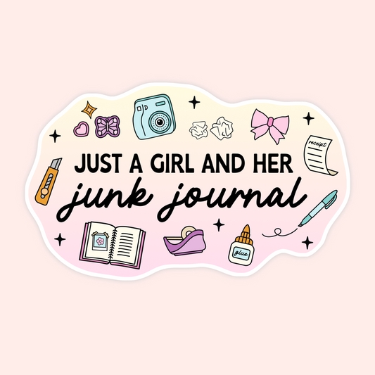 A die-cut sticker with a wavy border featuring cute school and stationery illustrations like a camera, bow, pencil, notebook, and glue stick, with the text 'JUST A GIRL AND HER junk journal' on a pale pink background.
