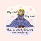 A die-cut sticker featuring a cartoon illustration of a girl in a voluminous purple dress with the text 'Hey now! this is what Dreams are made of' and pink stars on a pale pink background.