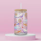 Pink glass tumbler with cartoon Lizzie McGuire reading, surrounded by stacks of pastel books, open pages, hearts, flowers, and stars — perfect for your inner Y2K bookworm.