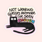 A die-cut sticker featuring a black cartoon cat lying down with the text 'NOT WEARING GLASSES ANYMORE. I'VE SEEN ENOUGH' in black and colorful lettering, shown on a pale pink background.