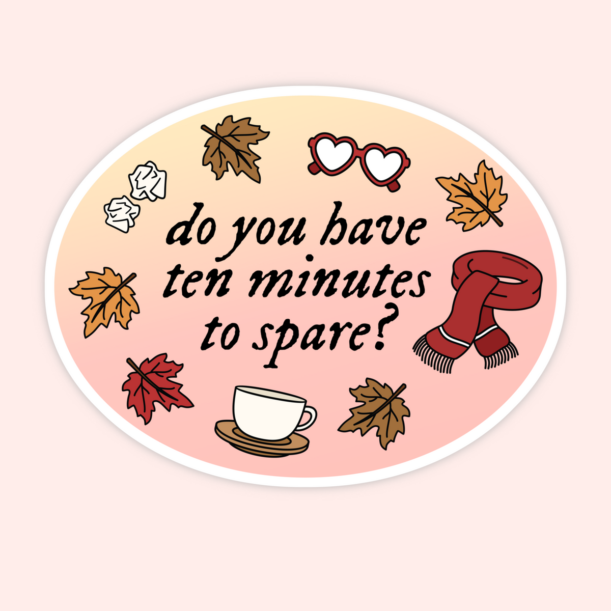 An oval sticker with a pastel gradient background featuring the text 'do you have ten minutes to spare?' in black script. The design includes autumn-themed illustrations such as leaves, a red scarf, heart-shaped glasses, crumpled paper, and a coffee cup on a light pink and peach gradient.