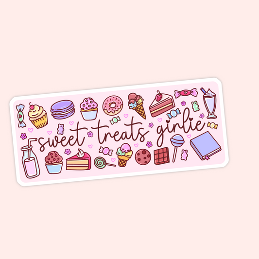 A rectangular sticker with rounded corners featuring a pink background and cute illustrations of sweets, cupcakes, ice cream, cake slices, lollipops, candies, and a book. The words 'sweet treats girlie' are written across the center in a playful script.