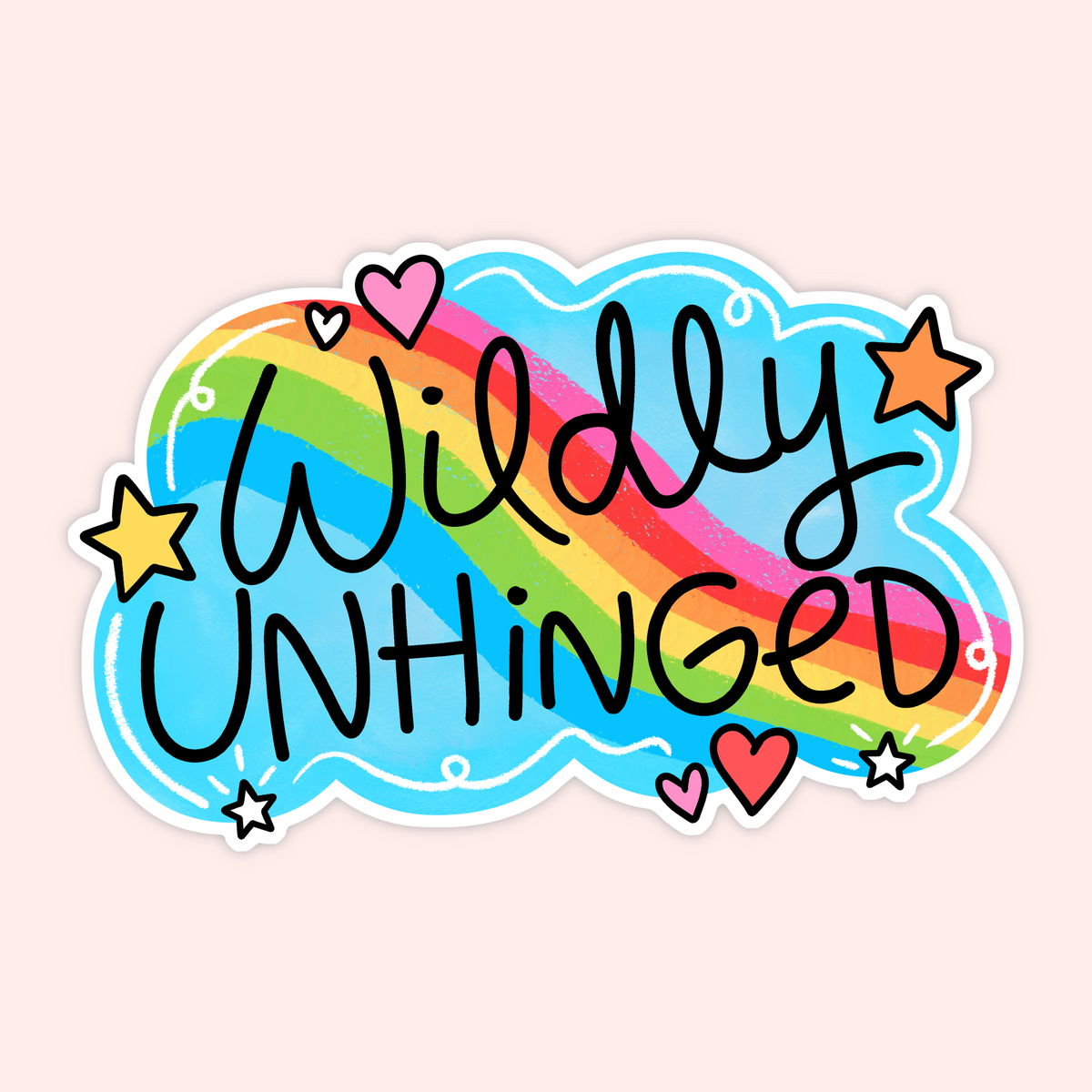 A die-cut sticker with the phrase 'Wildly UNHINGED' in black handwritten-style lettering over a rainbow cloud design with blue border, pink hearts, and orange/yellow stars, shown on a pale pink background.
